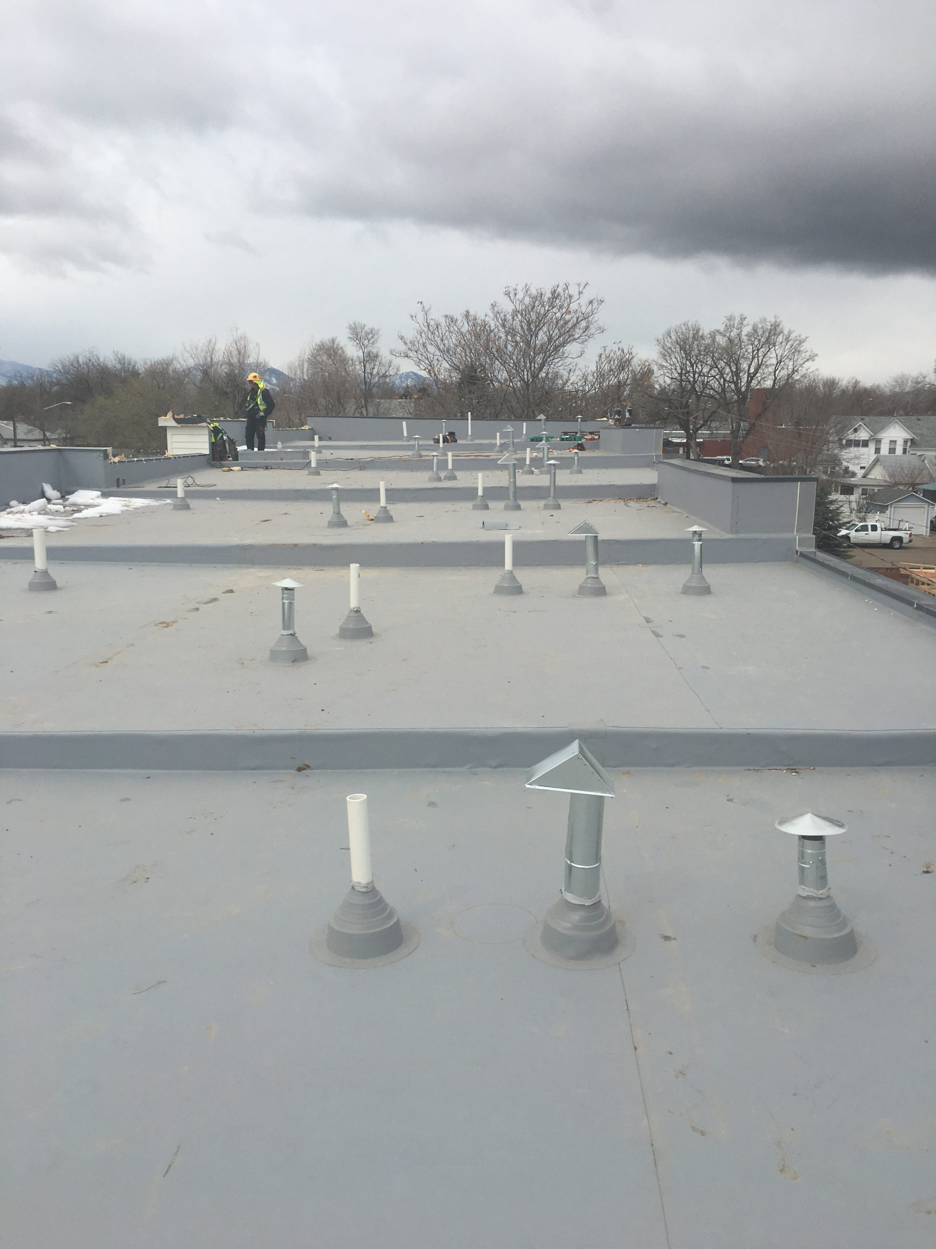 low sloe roofing on housing complex